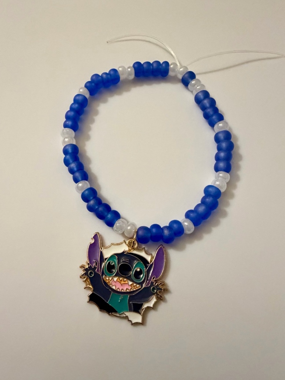 NEW! Jenny’s Handmade Blue and White Bracelet with Stitch Enamel Charm